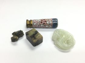 A small carved jade ornament and two other items (