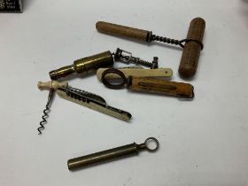 A bag of miniature and novelty corkscrews.