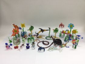 A collection of glass animals. Shipping category D