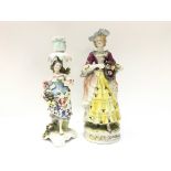 A pair of late 19th century style porcelain figure
