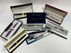 A collection of various pens including a Waterman 18k gold nib pen, Parker, Sheaffer, Cross etc