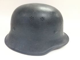 A German WW2 Helmet with Liner.