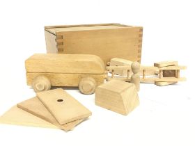 A Vintage conversion car toy by Kay Bojesen. This toy car set in natural wood was designed in 1935