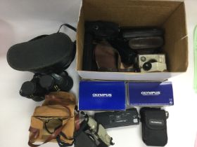 A box of cameras and accessories. Shipping categor