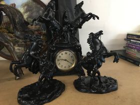 A spelter clock set in the form of Marley horses.