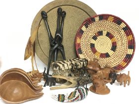 A collection of various Tribal art items Including