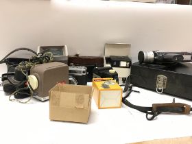 A collection of vintage camera equipment including