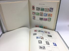 Two new age stamp albums containing an extensive c