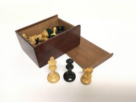 A Carved Wooden Chess Set.