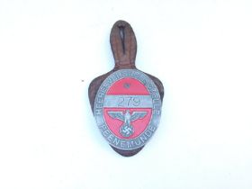 A Nazi Peenemunde Workers Badge.