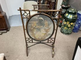 Bamboo fire screen with glass central panel with p