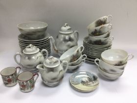 An Oriental tea service plus other cups and saucer