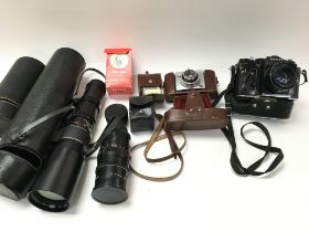 A Zenit camera and accessories etc. Postage B