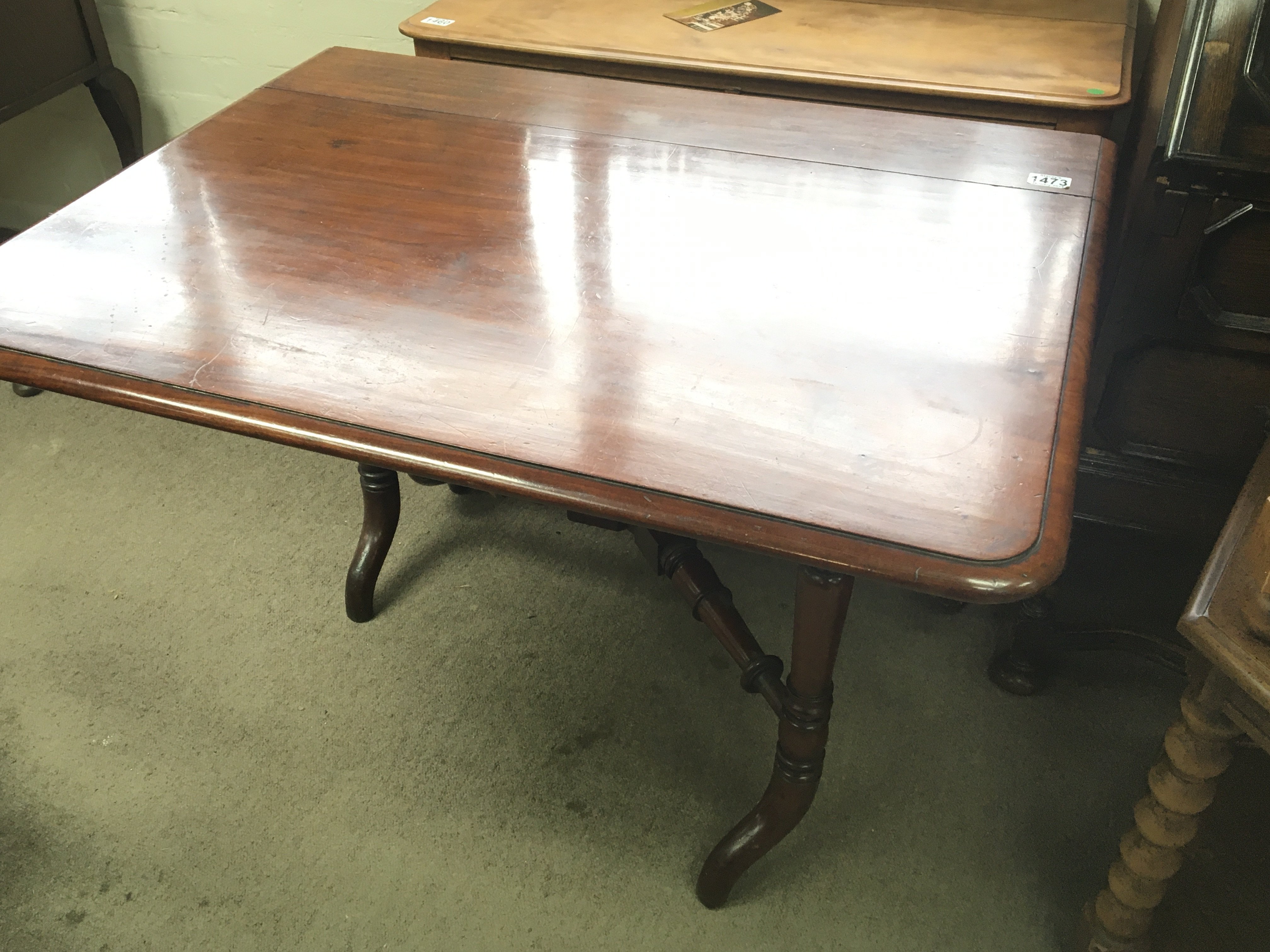 A Victorian Mahogany drop leaf Sutherland table wi