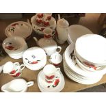 A Wedgwood Susie Cooper Corn poppy tea and dinner