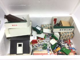 A box of vintage Scalextric accessories. Shipping category C.