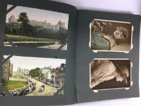 An album of vintage postcards including some signe