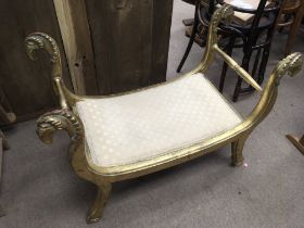 A modern gilt and carved wooden bedroom stool ,94c