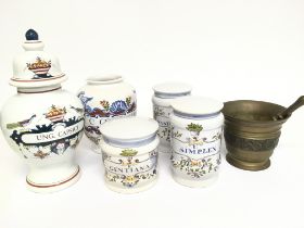 A Collection Of Apothecary Jars & Mortar And Pestl