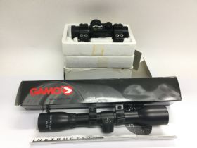 Two boxed air gun sights. Shipping category D.