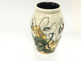 A small Moorcroft vase ref 2 SEAP393/4. Good condi