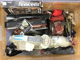 A collection of toys including Star Wars, Transfor