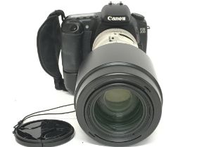 A Canon EOS 20D with Extender EF 1.4x II 70-200m &