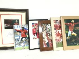 A collection of framed footballer autographs inclu