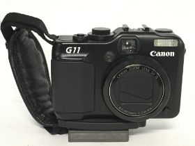 A Canon Powershot G11 camera, postage category B