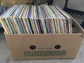 A large collection of 12 inch vinyl records includ