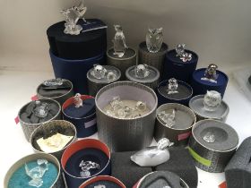 A large collection of Swarovski birds including va