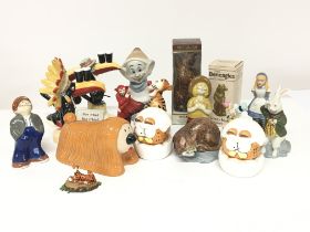 A collection of ceramic figures Royal Doulton Guin