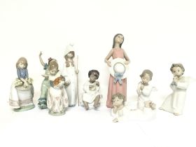 A collection of Lladro figures. Ranging from 6 to