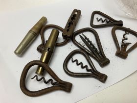 Eight folding corkscrews.