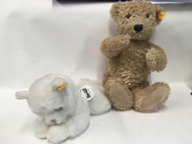 A Steiff bear and cat and two other bears.