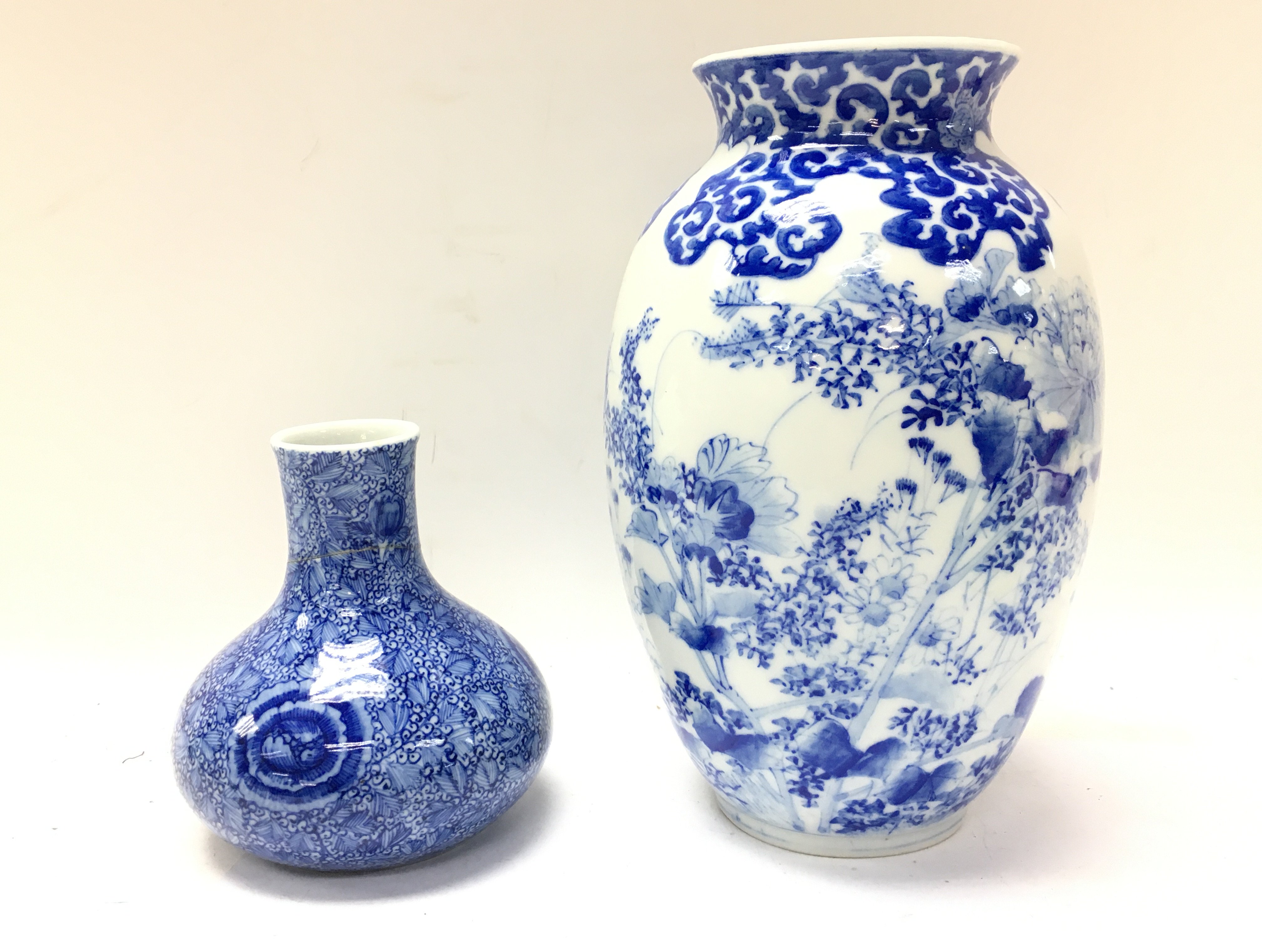 Chinese blue and white vases with floral decoratio