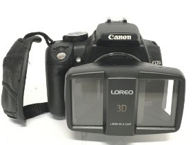 A Canon EOS 350D camera with Loreo 3D attached len