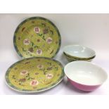 Two famille juane plates and two matching bowls pl