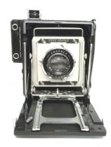 A cased Graphex Speed Graphic camera with an SE1 E