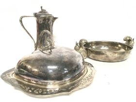 A collection of silver plate including a muffin di