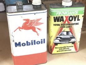 A vintage Mobil oil can (never opened) and wax can