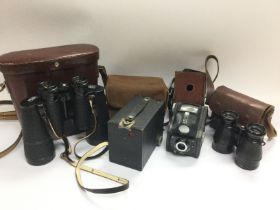 A pair of Carl Zeiss Jena binoculars, an Ensign Fu