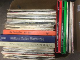 A box of LPs by various artists including swing er