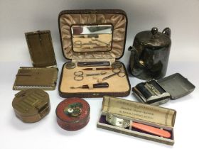 A collection of oddments comprising a brass cased