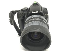 A Canon EOS 400D camera with Sigma 12-24mm f/4.5-5