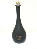 A bottle of Otard XO Cognac Chateau de Cognac. One