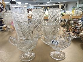 A collection of glass ware including cut glass vases, 5 glasses & 2 jugs.