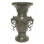 A large Japanese 19th century bronze vase with rai