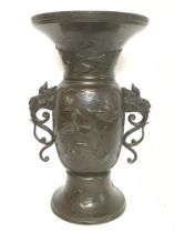 A large Japanese 19th century bronze vase with rai