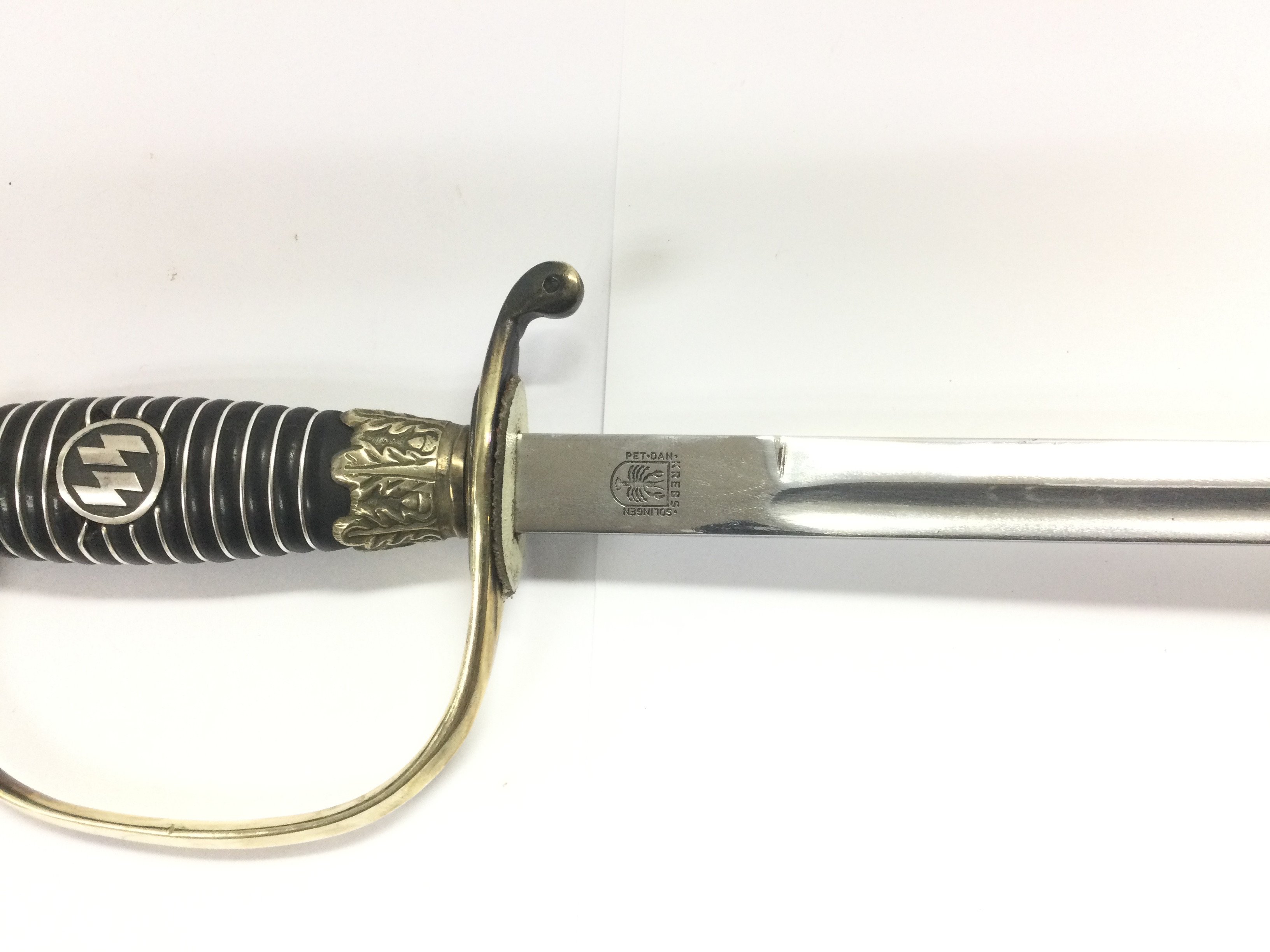 A WW2 SS officer's sword with silver plated fittings and SS approved stamps and markings complete - Image 2 of 4